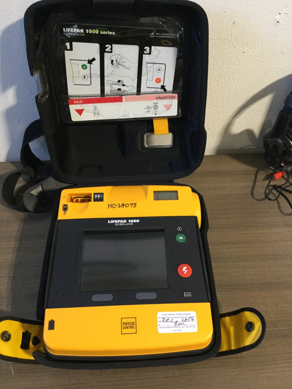 MEDTRONIC LIFEPAK 1000 DEFIBRILLATOR NO BATTERY